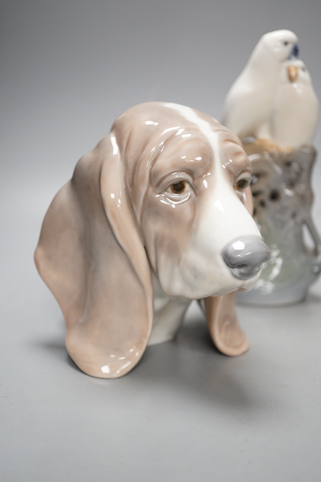 A Royal Copenhagen cat 304, love birds 649, dove 4727, a Lladro dog's head and a Nao figure of a yawning dog - tallest 19cm (5)